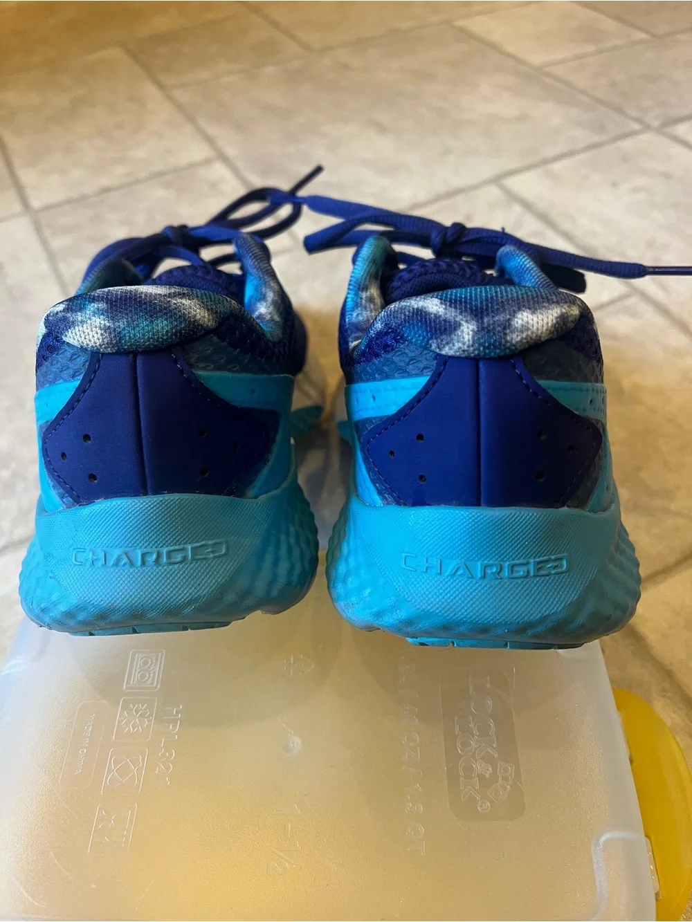 Under Armour Charged Rogue running shoes. Purple and teal. 6y or 7.5-8 women.
